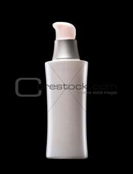 White bottle of cosmetics