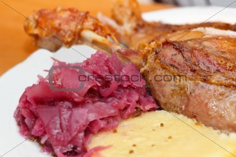 roasted duck with red cabbage and dumplings