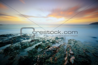 Moody seascape at sunset