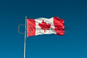 Waving Canadian Flag with Blue Sky