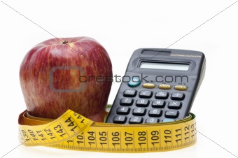 Apple, tape and calculator
