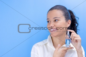 girl holding perfume