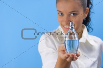 girl holding perfume