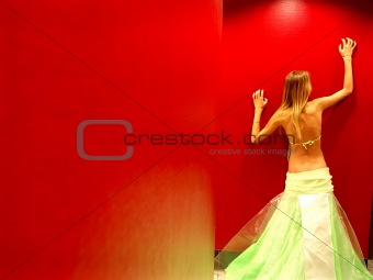women on a red wall