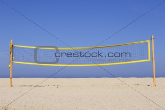 beach volleyball net on sandy beach, corsica