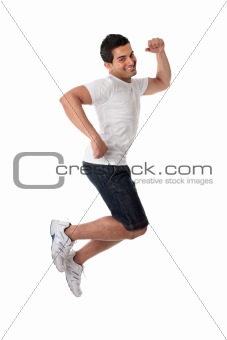 Thrilled man jumping for joy