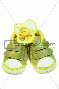 Baby’s bootee and pacifier