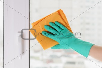 hand in a green glove