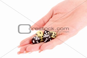 Dices in woman hand isolated on white