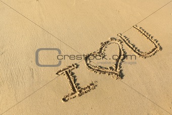 "I love you" drawing on the beach