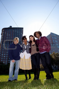 Four People in Urban Park