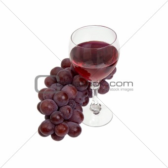 Red grapes and glass with wine