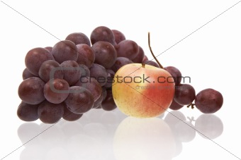 Apple and grapes on a white background