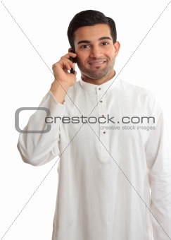 Smiling man using phone