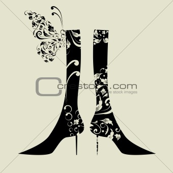 Fashion design of female boots with floral ornament