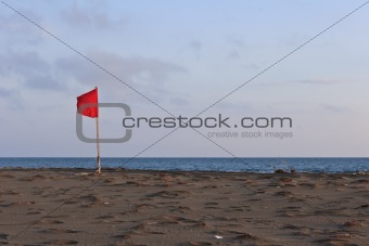 red flag on beach