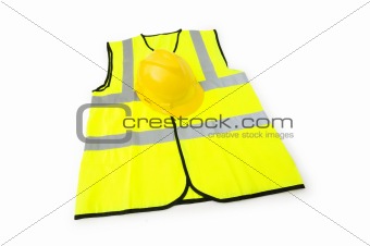 Yellow vest  and hardhat isolated on the white