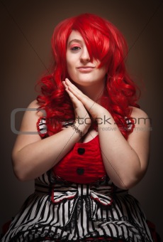 Attractive Red Haired Woman Portrait on a Grey Background.