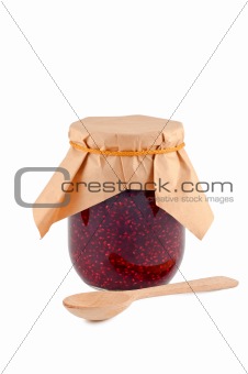 Jam in glass jar isolated on white background.