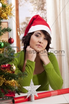 Woman near Christmas tree