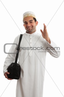 Friendly ethnic man waving