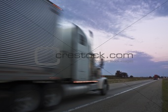 Truck driving during sunset