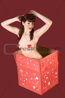 Pin up naked woman in Valentine's day present box