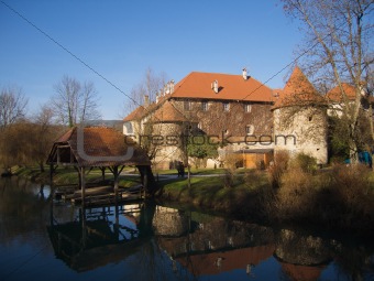 Castle Otocec with boathouse