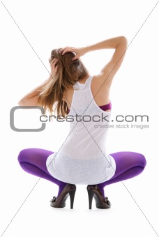 Beautiful woman in violet stockings