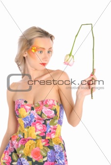 Young woman with  broken flower