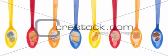 Variety of Cereals in Vibrant Spoons with Milk