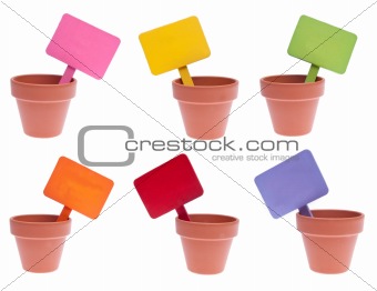 Group of Clay Pots with Vibrant Colored Blank Signs