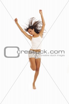 Cute young energetic girl dancing and jumping