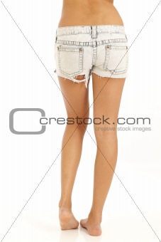 Back side of young sexy woman wearing jean shorts