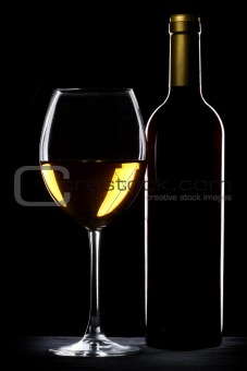 White wine bottle and glass
