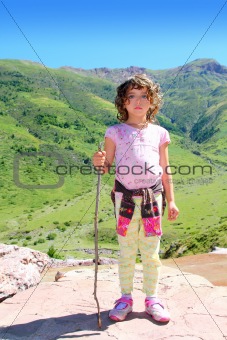 Explorer mountain girl hicker stick cane green valley