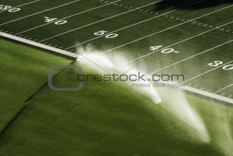 sprinkler on football field
