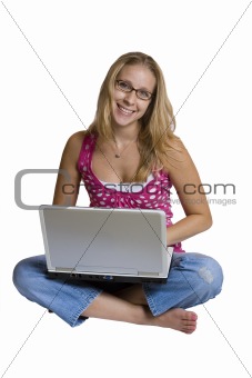 A beautiful young lady using her laptop