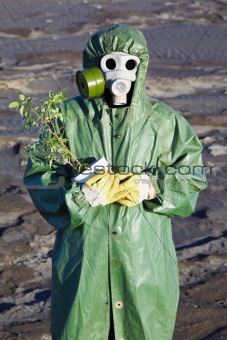 Scientific Environmentalist gently hugs a plant