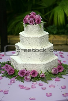 Tiered Wedding Cake with Purple Flowers