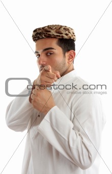 Ethnic man pointing finger at you