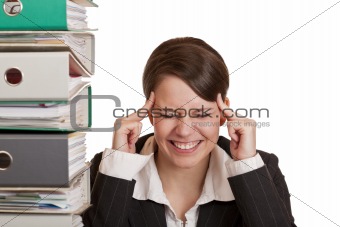Business woman in office has migraine because of stress