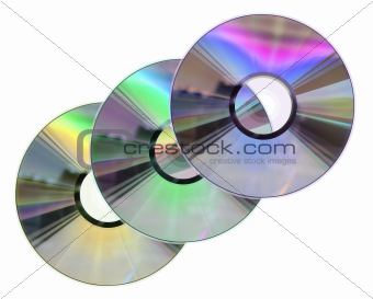 Three colored CD / DVD disks isolated on White