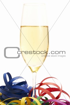 glass of champagne between streamer