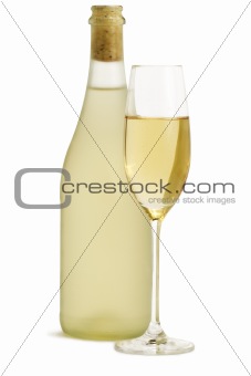 glass of champagne in front of standing prosecco bottle