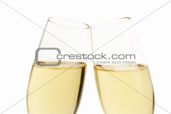 closeup of two aslope glasses with champagne