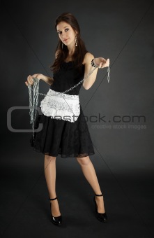 Woman in maid costume with chain
