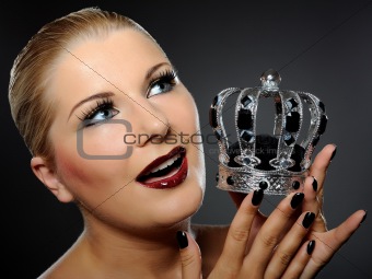 elegant queen female face with red shiny lips and black eye make
