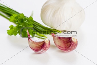Cloves of garlic with herbs