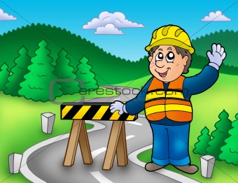 Construction worker standing on road